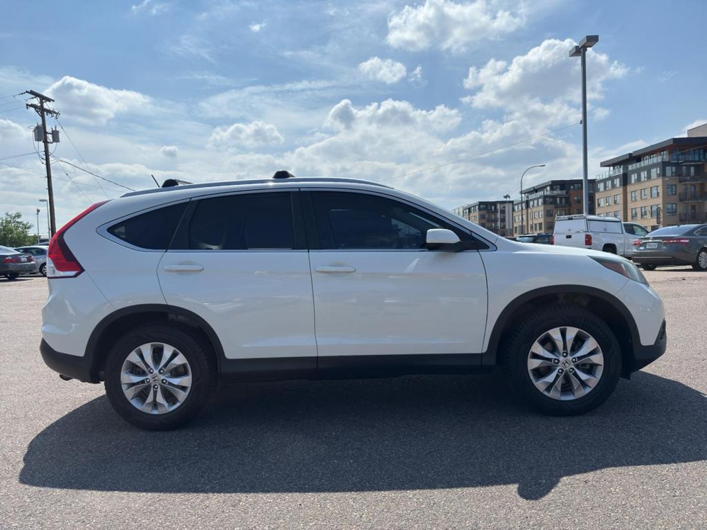 2014 WHITE Honda CR-V EX-L (5J6RM4H70EL) with an 4 Cyl, 2.4L engine, Automatic transmission, located at 10890 W. Colfax Ave., Lakewood, CO, 80215, (303) 274-7692, 39.739914, -105.120132 - Photo#3