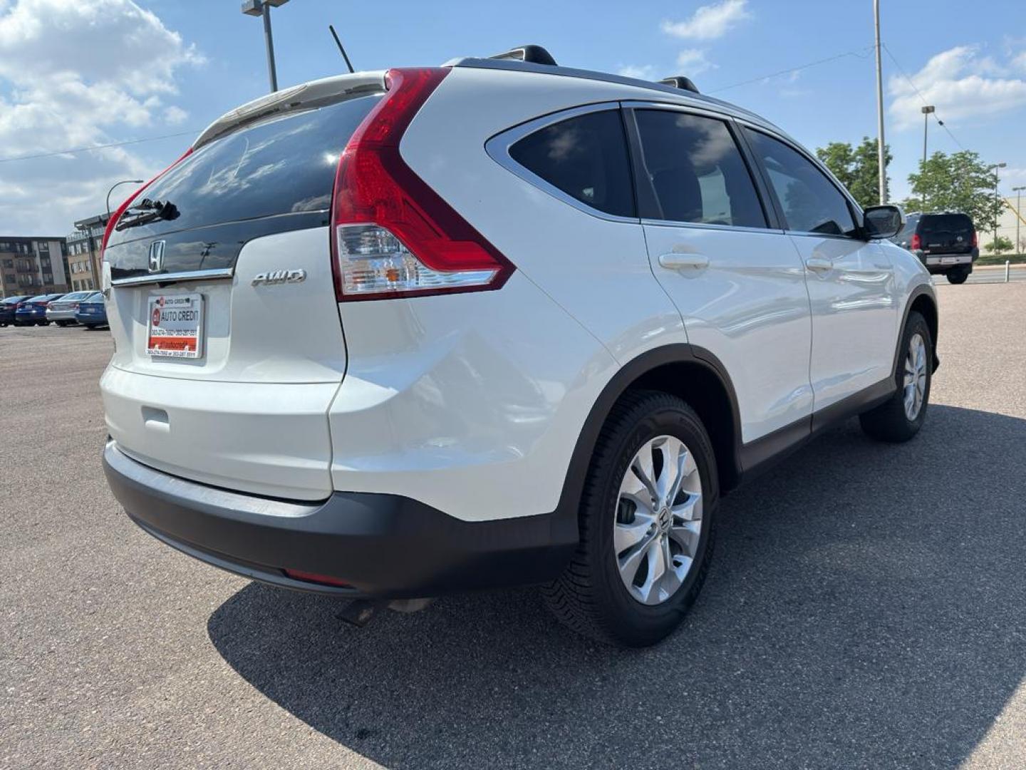 2014 WHITE Honda CR-V EX-L (5J6RM4H70EL) with an 4 Cyl, 2.4L engine, Automatic transmission, located at 10890 W. Colfax Ave., Lakewood, CO, 80215, (303) 274-7692, 39.739914, -105.120132 - Photo#4