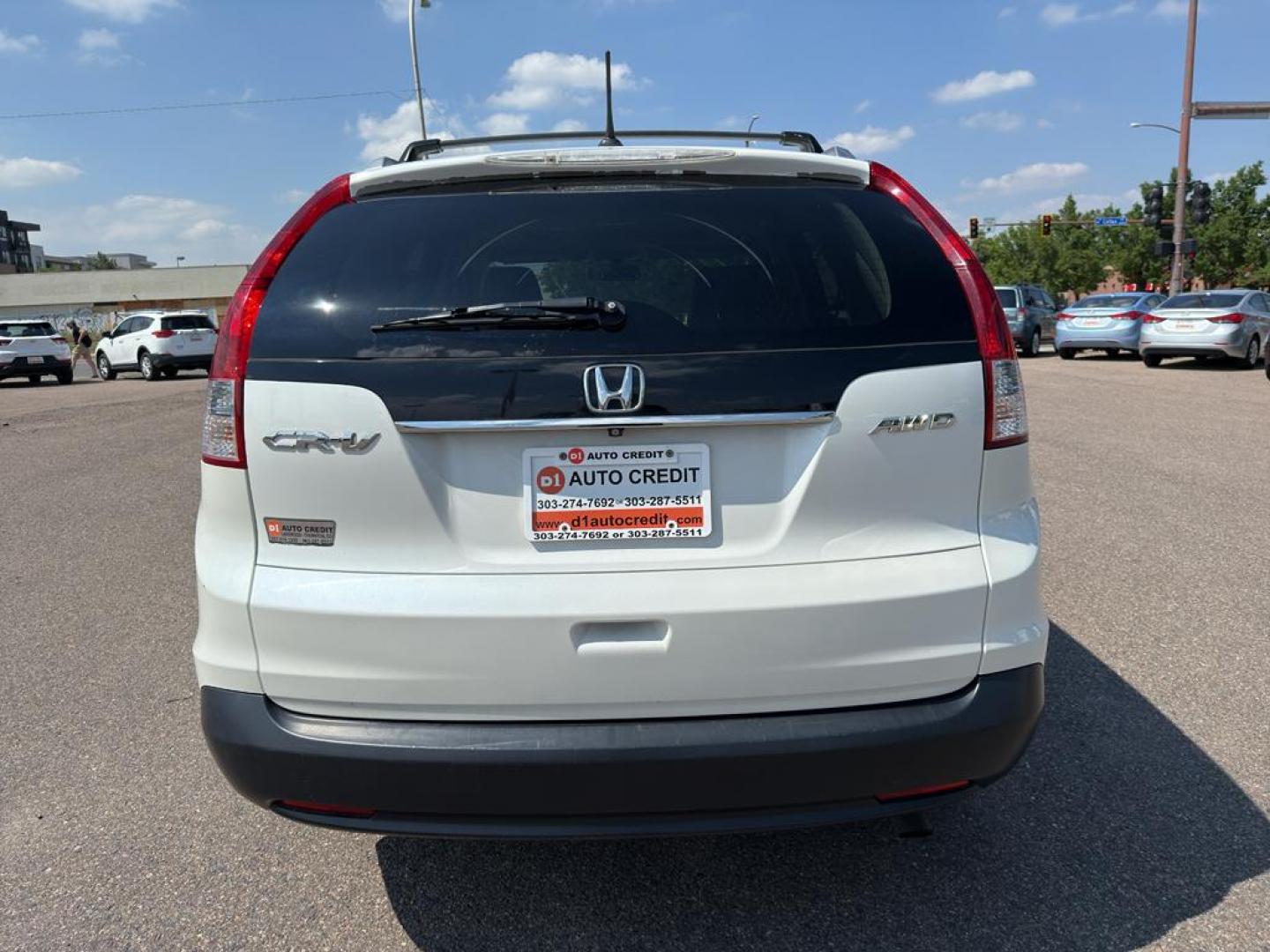 2014 WHITE Honda CR-V EX-L (5J6RM4H70EL) with an 4 Cyl, 2.4L engine, Automatic transmission, located at 10890 W. Colfax Ave., Lakewood, CO, 80215, (303) 274-7692, 39.739914, -105.120132 - Photo#5