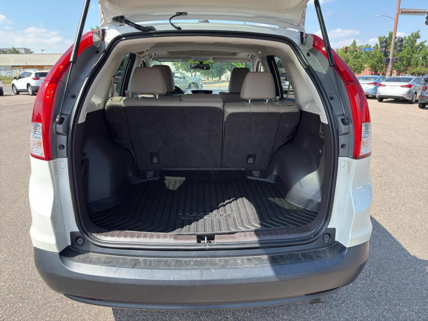 2014 WHITE Honda CR-V EX-L (5J6RM4H70EL) with an 4 Cyl, 2.4L engine, Automatic transmission, located at 10890 W. Colfax Ave., Lakewood, CO, 80215, (303) 274-7692, 39.739914, -105.120132 - Photo#11