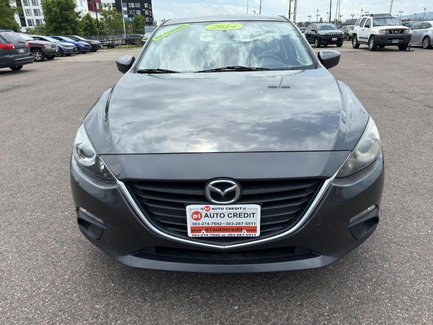 2014 GREEN Mazda Mazda3 i Sport w/SKYACTIV-G (JM1BM1U71E1) with an 4 Cyl, 2.0L engine, Automatic transmission, located at 10890 W. Colfax Ave., Lakewood, CO, 80215, (303) 274-7692, 39.739914, -105.120132 - Introducing the 2014 Mazda Mazda3 i Sport, a superb blend of style, efficiency, and performance that suits both urban and highway driving. This compact sedan is powered by a responsive 2.0L 4-cylinder SKYACTIV-G engine, delivering an impressive balance of power and fuel efficiency. The front-wheel-d - Photo#1