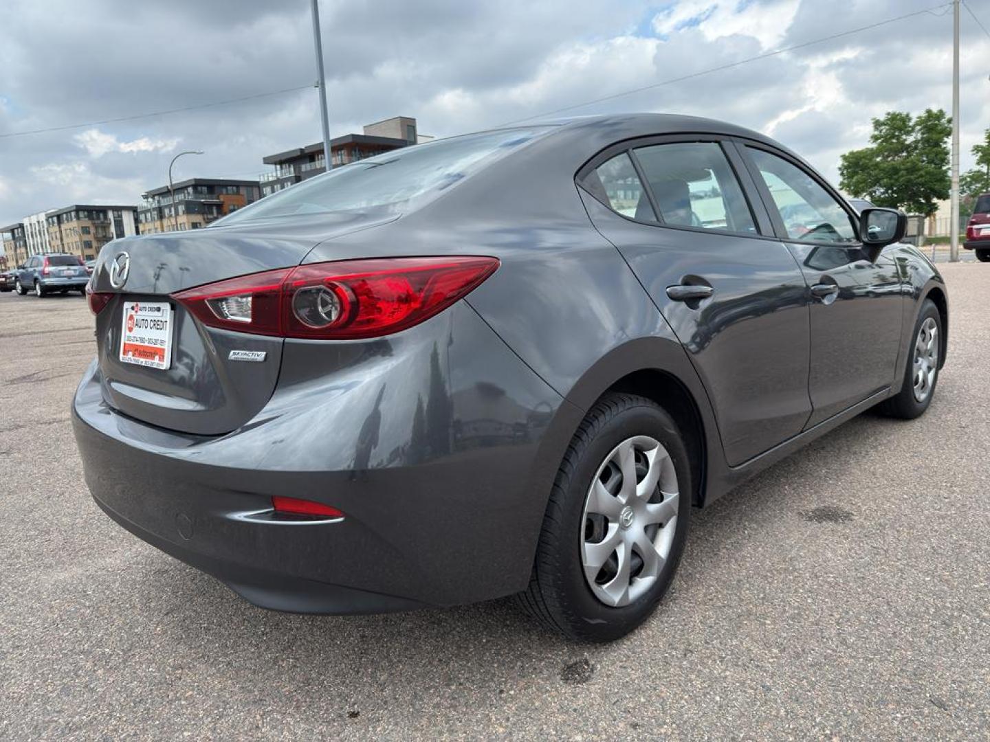 2014 GREEN Mazda Mazda3 i Sport w/SKYACTIV-G (JM1BM1U71E1) with an 4 Cyl, 2.0L engine, Automatic transmission, located at 10890 W. Colfax Ave., Lakewood, CO, 80215, (303) 274-7692, 39.739914, -105.120132 - Introducing the 2014 Mazda Mazda3 i Sport, a superb blend of style, efficiency, and performance that suits both urban and highway driving. This compact sedan is powered by a responsive 2.0L 4-cylinder SKYACTIV-G engine, delivering an impressive balance of power and fuel efficiency. The front-wheel-d - Photo#4