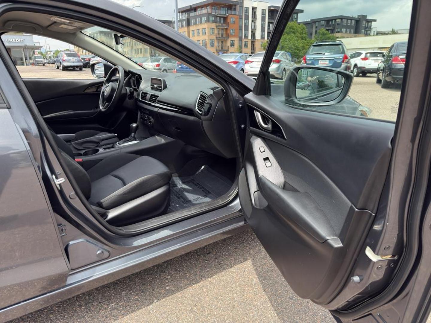2014 GREEN Mazda Mazda3 i Sport w/SKYACTIV-G (JM1BM1U71E1) with an 4 Cyl, 2.0L engine, Automatic transmission, located at 10890 W. Colfax Ave., Lakewood, CO, 80215, (303) 274-7692, 39.739914, -105.120132 - Introducing the 2014 Mazda Mazda3 i Sport, a superb blend of style, efficiency, and performance that suits both urban and highway driving. This compact sedan is powered by a responsive 2.0L 4-cylinder SKYACTIV-G engine, delivering an impressive balance of power and fuel efficiency. The front-wheel-d - Photo#8