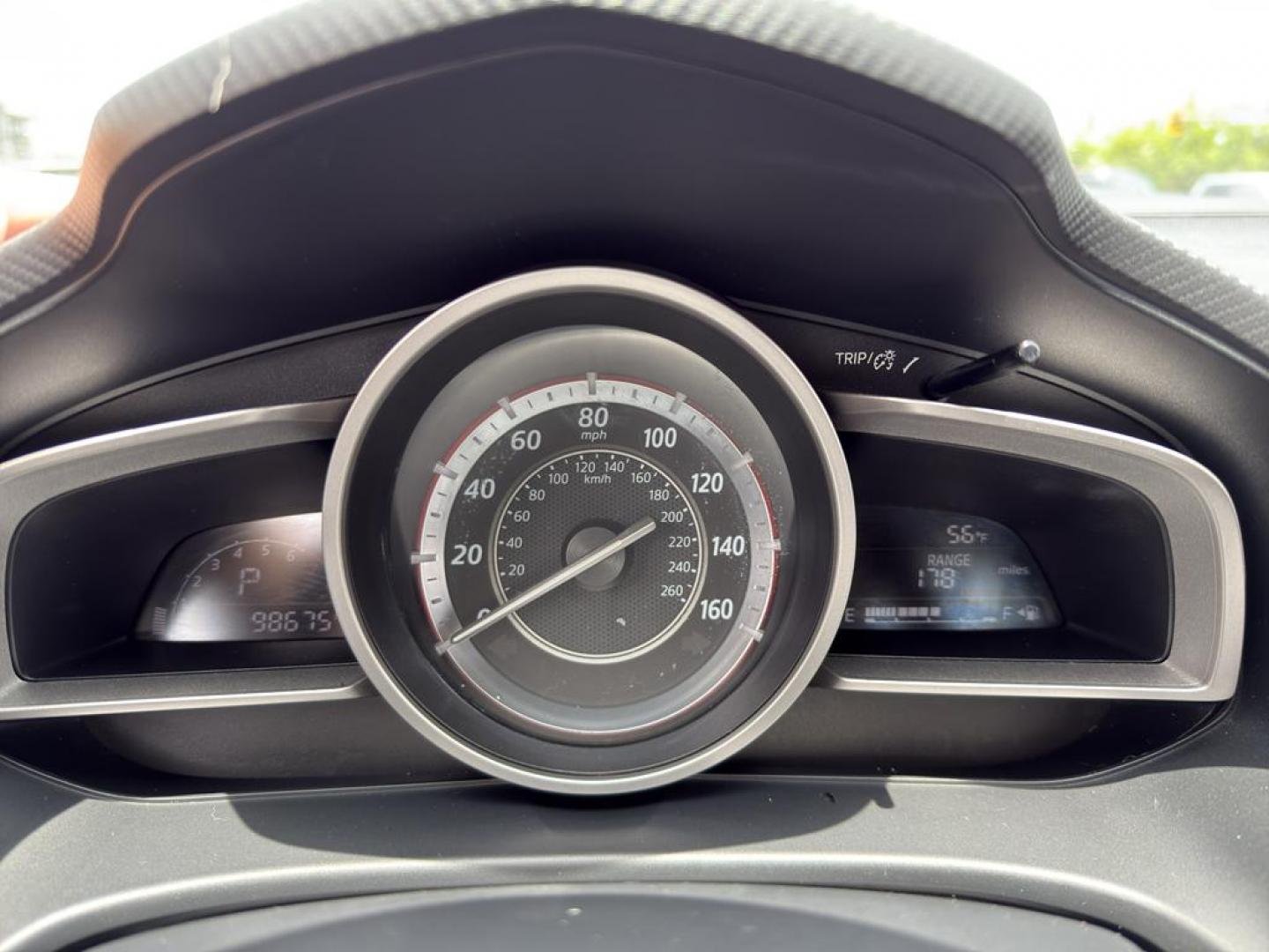 2014 GREEN Mazda Mazda3 i Sport w/SKYACTIV-G (JM1BM1U71E1) with an 4 Cyl, 2.0L engine, Automatic transmission, located at 10890 W. Colfax Ave., Lakewood, CO, 80215, (303) 274-7692, 39.739914, -105.120132 - Introducing the 2014 Mazda Mazda3 i Sport, a superb blend of style, efficiency, and performance that suits both urban and highway driving. This compact sedan is powered by a responsive 2.0L 4-cylinder SKYACTIV-G engine, delivering an impressive balance of power and fuel efficiency. The front-wheel-d - Photo#18