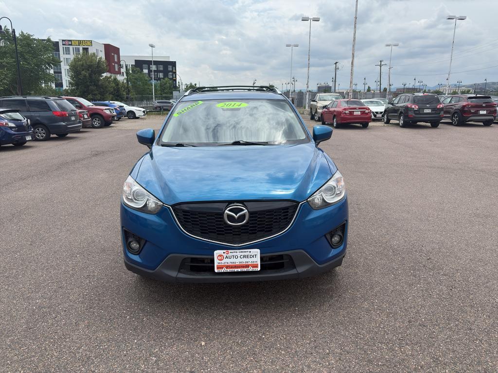 2014 BLUE Mazda CX-5 Grand Touring (JM3KE4DY6E0) with an 4 Cyl, 2.5L engine, Automatic transmission, located at 10890 W. Colfax Ave., Lakewood, CO, 80215, (303) 274-7692, 39.739914, -105.120132 - Photo#1