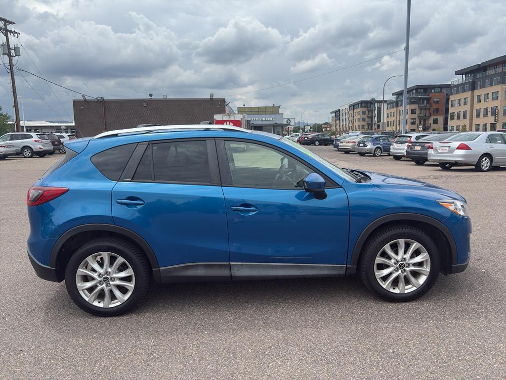 2014 BLUE Mazda CX-5 Grand Touring (JM3KE4DY6E0) with an 4 Cyl, 2.5L engine, Automatic transmission, located at 10890 W. Colfax Ave., Lakewood, CO, 80215, (303) 274-7692, 39.739914, -105.120132 - Photo#3