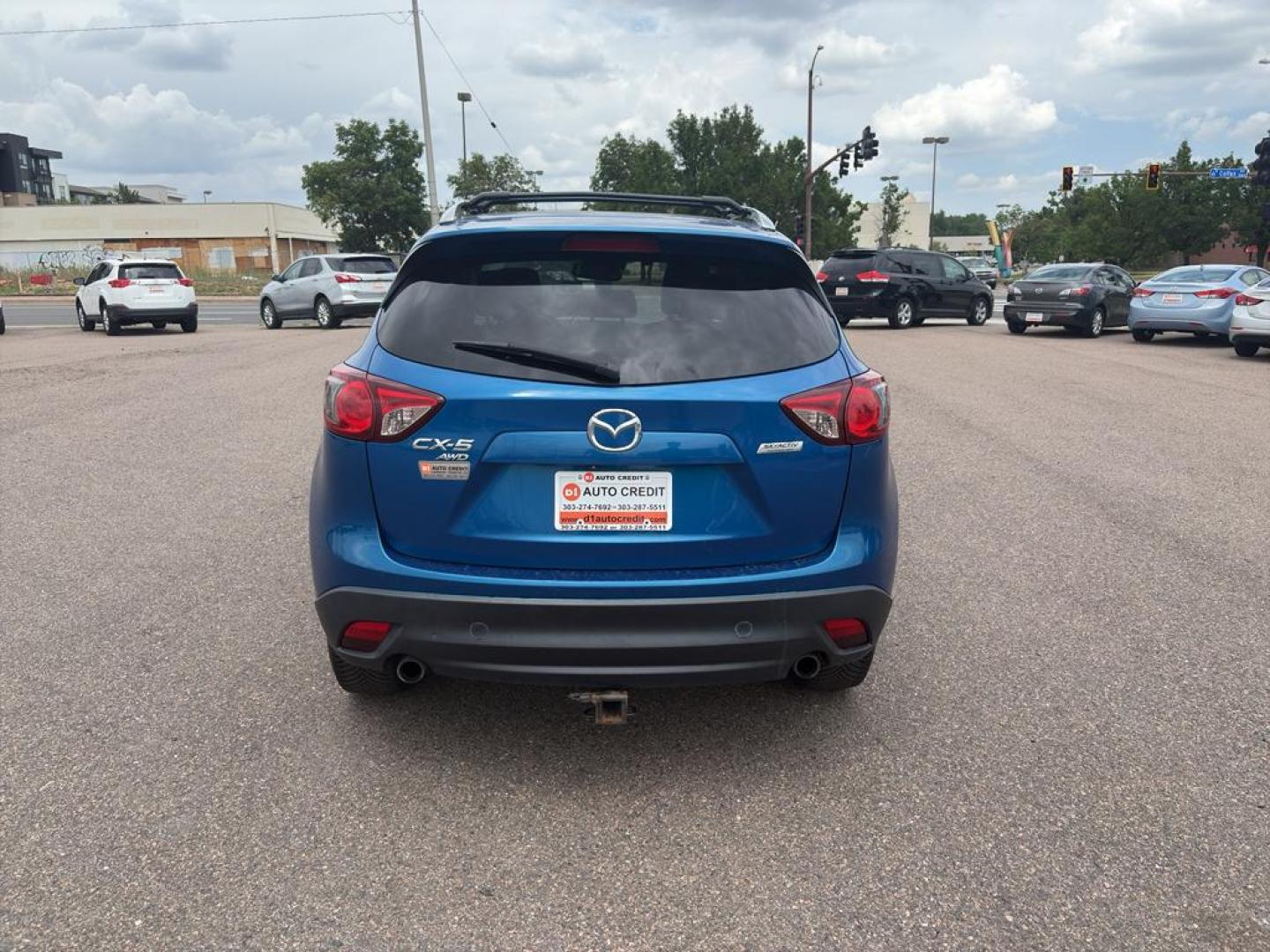 2014 BLUE Mazda CX-5 Grand Touring (JM3KE4DY6E0) with an 4 Cyl, 2.5L engine, Automatic transmission, located at 10890 W. Colfax Ave., Lakewood, CO, 80215, (303) 274-7692, 39.739914, -105.120132 - Photo#5