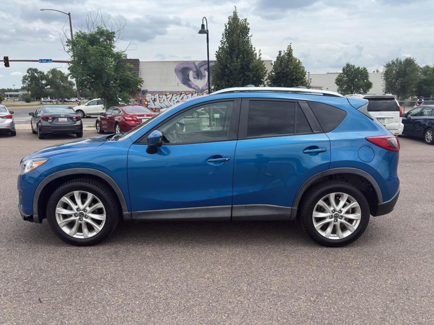 2014 BLUE Mazda CX-5 Grand Touring (JM3KE4DY6E0) with an 4 Cyl, 2.5L engine, Automatic transmission, located at 10890 W. Colfax Ave., Lakewood, CO, 80215, (303) 274-7692, 39.739914, -105.120132 - Photo#7