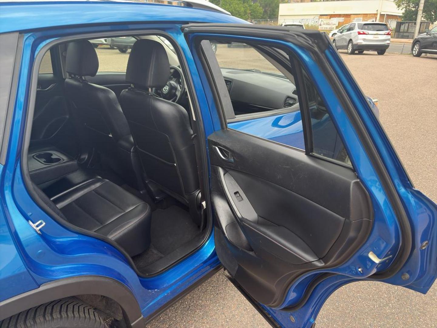 2014 BLUE Mazda CX-5 Grand Touring (JM3KE4DY6E0) with an 4 Cyl, 2.5L engine, Automatic transmission, located at 10890 W. Colfax Ave., Lakewood, CO, 80215, (303) 274-7692, 39.739914, -105.120132 - Photo#10