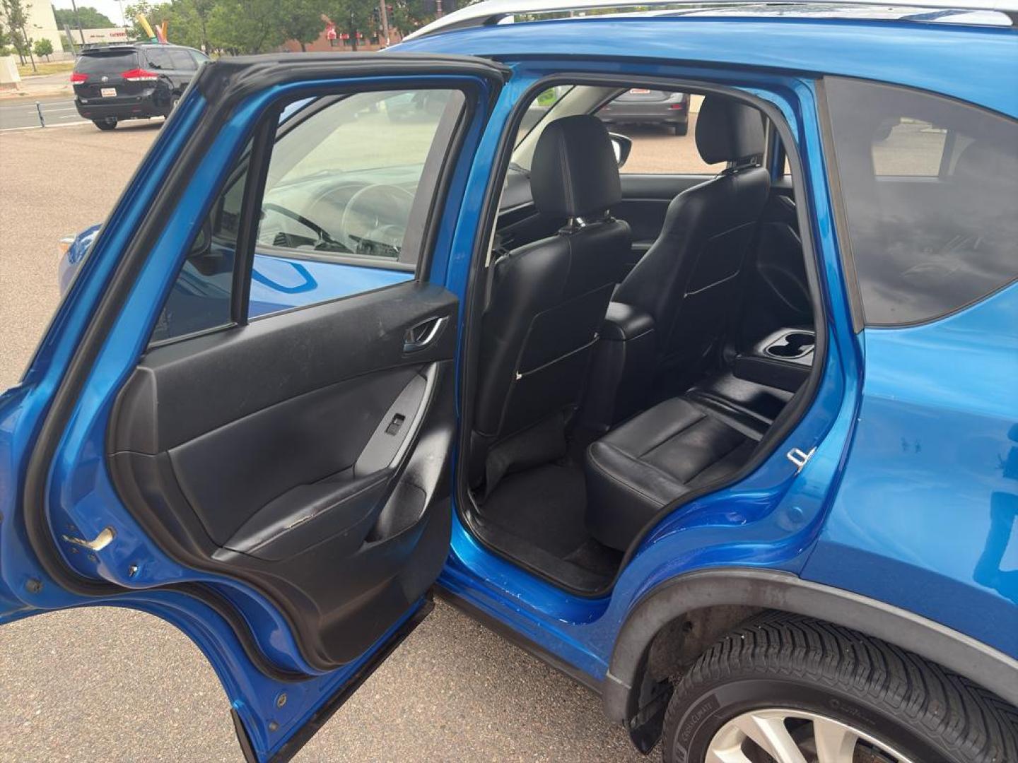 2014 BLUE Mazda CX-5 Grand Touring (JM3KE4DY6E0) with an 4 Cyl, 2.5L engine, Automatic transmission, located at 10890 W. Colfax Ave., Lakewood, CO, 80215, (303) 274-7692, 39.739914, -105.120132 - Photo#12