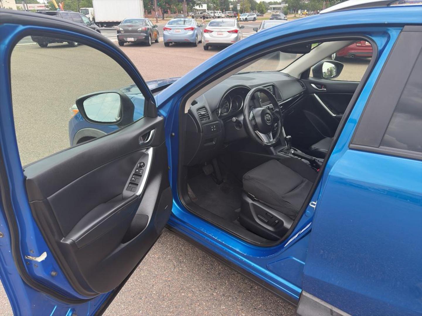 2014 BLUE Mazda CX-5 Grand Touring (JM3KE4DY6E0) with an 4 Cyl, 2.5L engine, Automatic transmission, located at 10890 W. Colfax Ave., Lakewood, CO, 80215, (303) 274-7692, 39.739914, -105.120132 - Photo#14