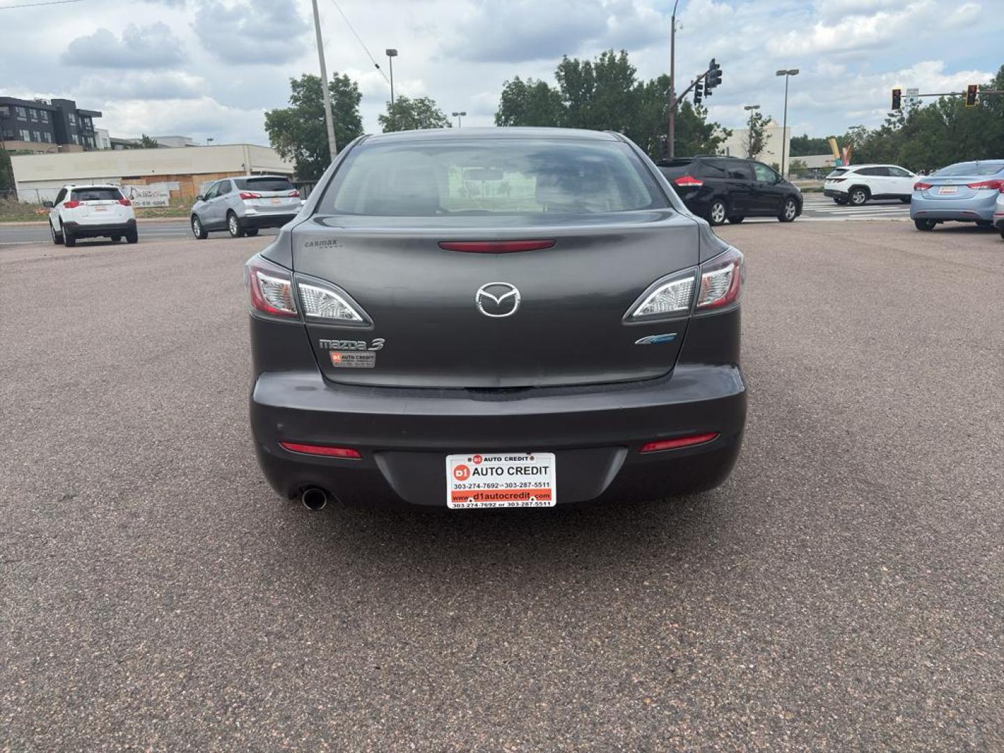 2012 GRAY Mazda Mazda3 i Touring w/SKYACTIV-G (JM1BL1V83C1) with an 4 Cyl, 2.0L engine, Automatic transmission, located at 10890 W. Colfax Ave., Lakewood, CO, 80215, (303) 274-7692, 39.739914, -105.120132 - Photo#5
