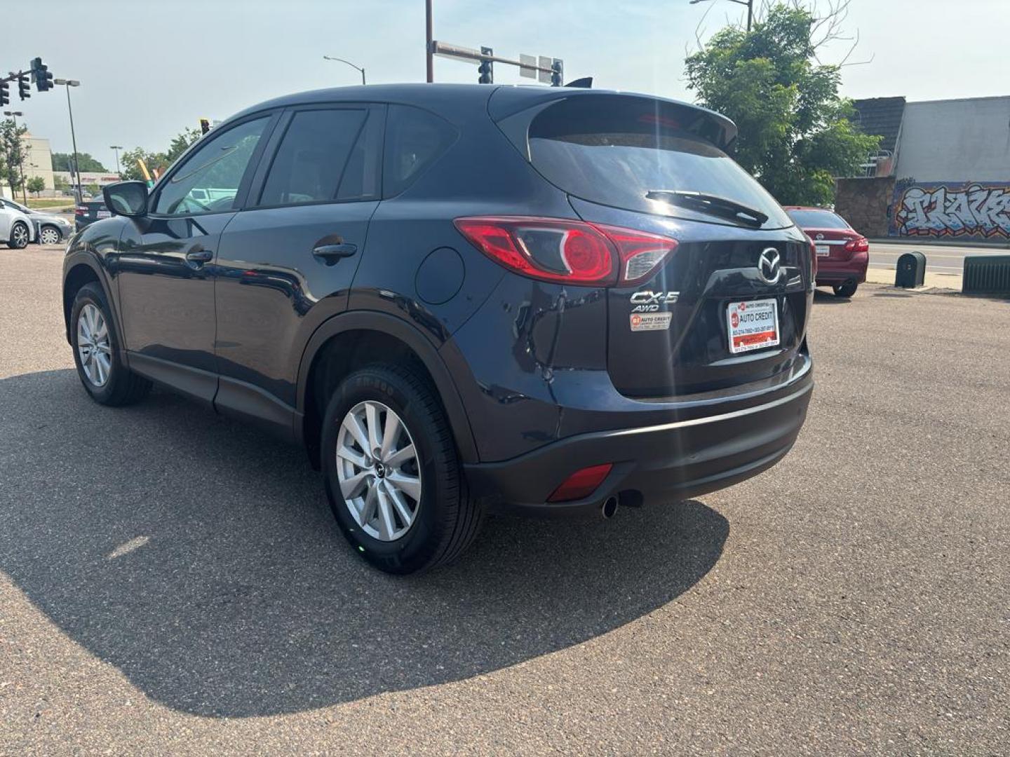 2016 BLUE Mazda CX-5 Touring (JM3KE4CY5G0) with an 4 Cyl, 2.5L engine, Automatic transmission, located at 10890 W. Colfax Ave., Lakewood, CO, 80215, (303) 274-7692, 39.739914, -105.120132 - Photo#6