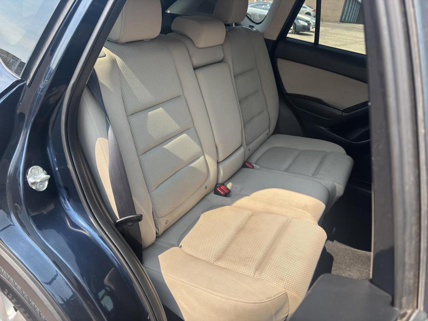 2016 BLUE Mazda CX-5 Touring (JM3KE4CY5G0) with an 4 Cyl, 2.5L engine, Automatic transmission, located at 10890 W. Colfax Ave., Lakewood, CO, 80215, (303) 274-7692, 39.739914, -105.120132 - Photo#10