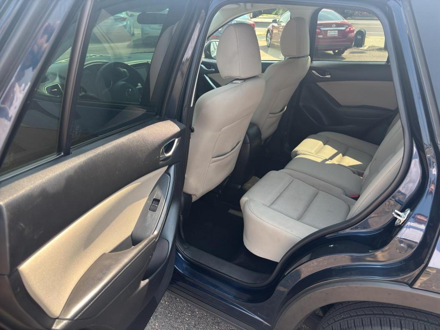 2016 BLUE Mazda CX-5 Touring (JM3KE4CY5G0) with an 4 Cyl, 2.5L engine, Automatic transmission, located at 10890 W. Colfax Ave., Lakewood, CO, 80215, (303) 274-7692, 39.739914, -105.120132 - Photo#11