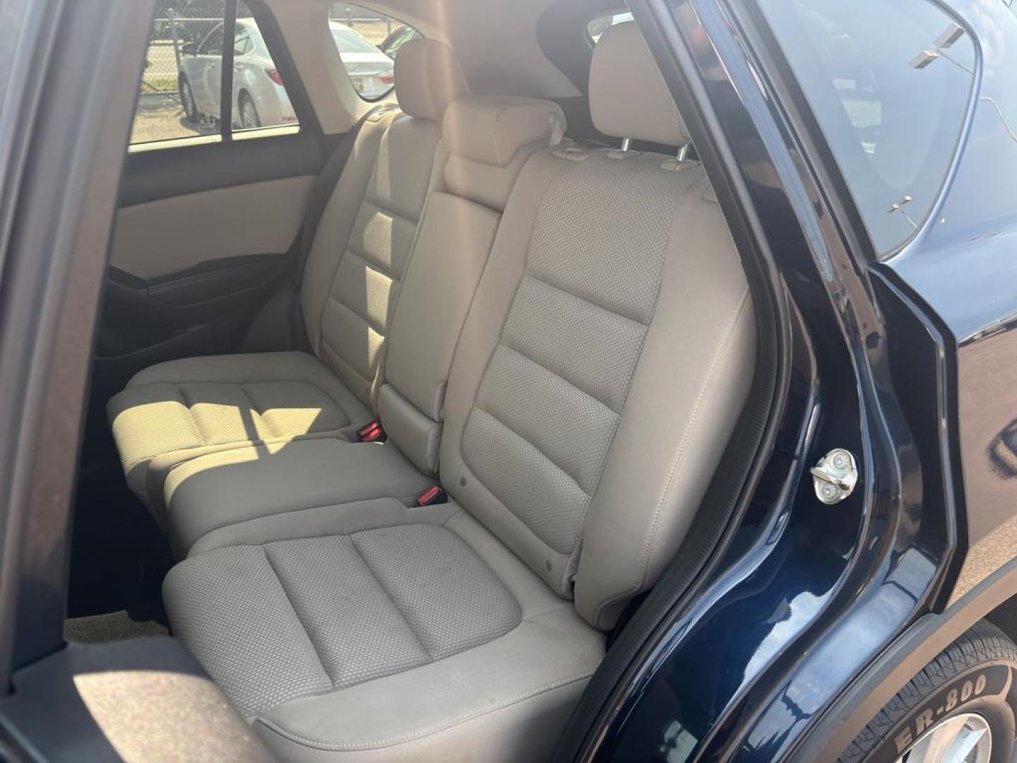 2016 BLUE Mazda CX-5 Touring (JM3KE4CY5G0) with an 4 Cyl, 2.5L engine, Automatic transmission, located at 10890 W. Colfax Ave., Lakewood, CO, 80215, (303) 274-7692, 39.739914, -105.120132 - Photo#12