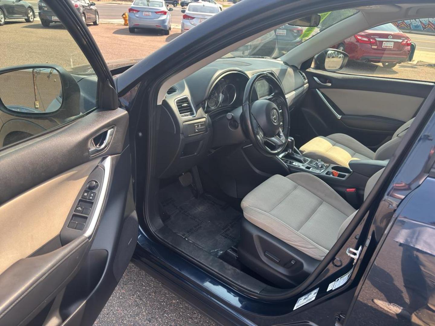 2016 BLUE Mazda CX-5 Touring (JM3KE4CY5G0) with an 4 Cyl, 2.5L engine, Automatic transmission, located at 10890 W. Colfax Ave., Lakewood, CO, 80215, (303) 274-7692, 39.739914, -105.120132 - Photo#13