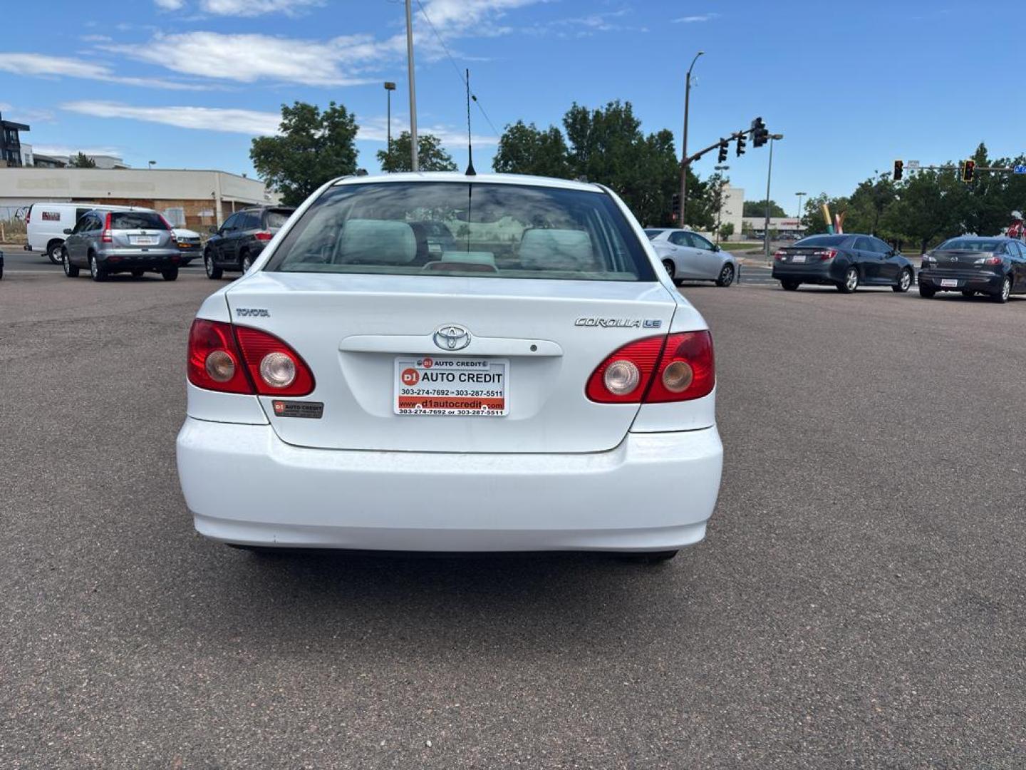 2007 WHITE Toyota Corolla CE (1NXBR32E97Z) with an 4 Cyl, 1.8L engine, Automatic transmission, located at 10890 W. Colfax Ave., Lakewood, CO, 80215, (303) 274-7692, 39.739914, -105.120132 - Photo#4