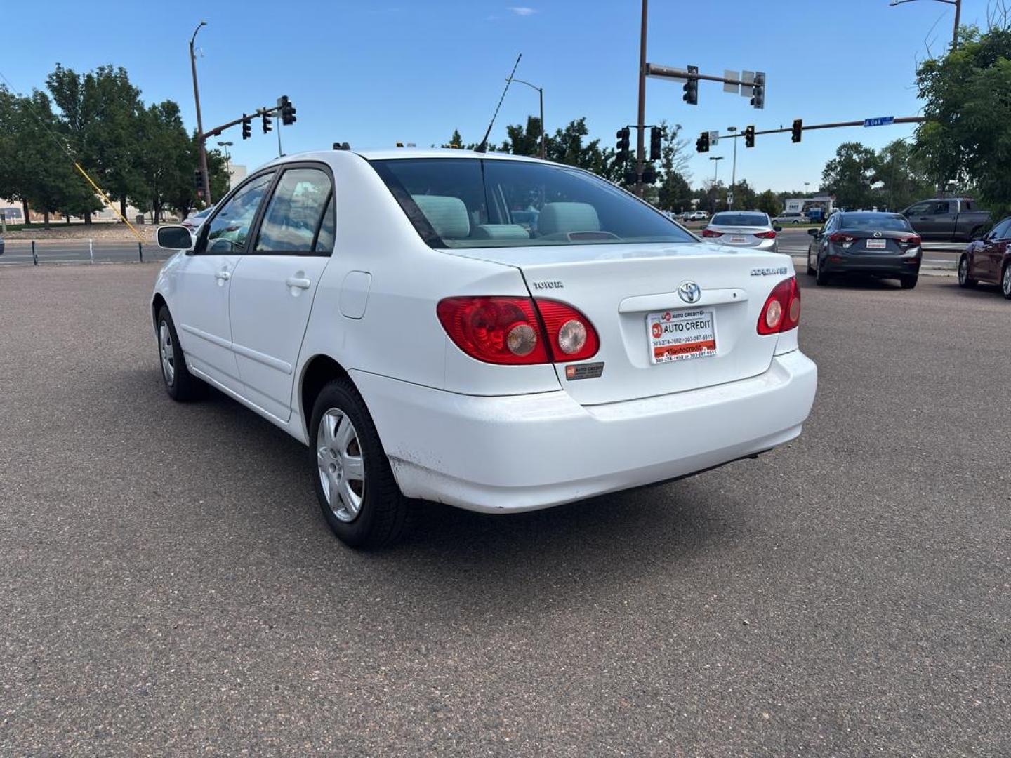 2007 WHITE Toyota Corolla CE (1NXBR32E97Z) with an 4 Cyl, 1.8L engine, Automatic transmission, located at 10890 W. Colfax Ave., Lakewood, CO, 80215, (303) 274-7692, 39.739914, -105.120132 - Photo#5