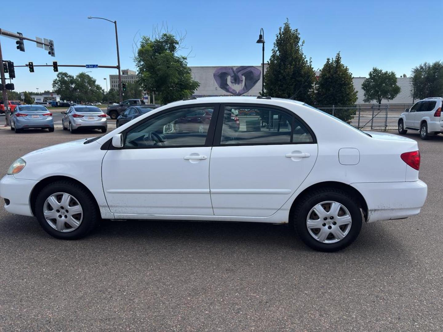 2007 WHITE Toyota Corolla CE (1NXBR32E97Z) with an 4 Cyl, 1.8L engine, Automatic transmission, located at 10890 W. Colfax Ave., Lakewood, CO, 80215, (303) 274-7692, 39.739914, -105.120132 - Photo#6