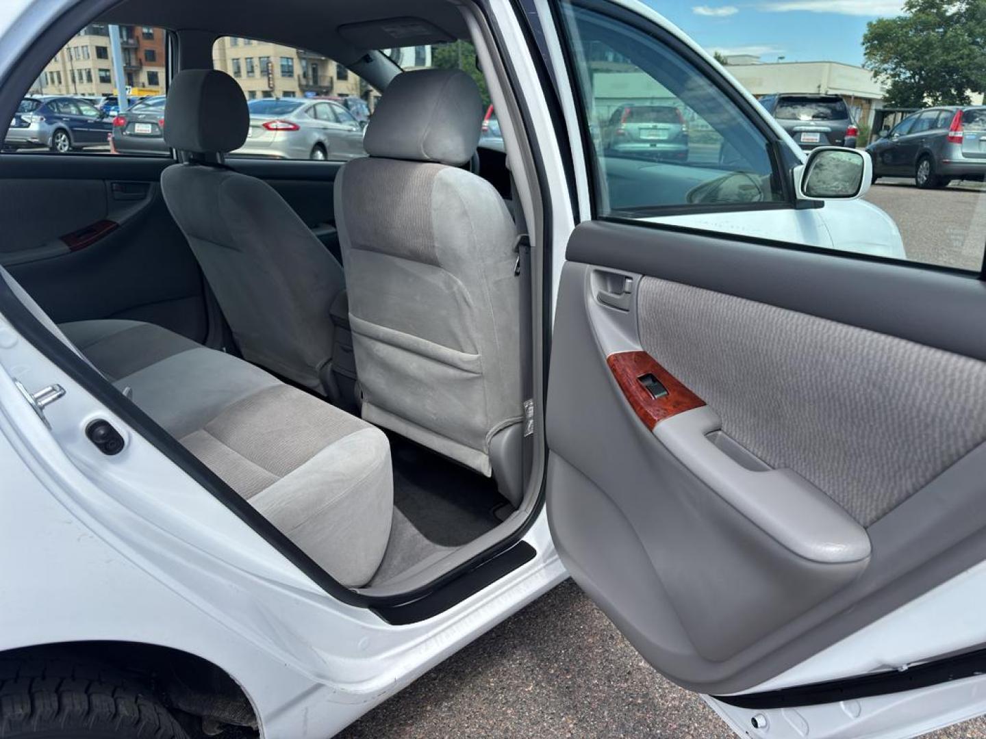 2007 WHITE Toyota Corolla CE (1NXBR32E97Z) with an 4 Cyl, 1.8L engine, Automatic transmission, located at 10890 W. Colfax Ave., Lakewood, CO, 80215, (303) 274-7692, 39.739914, -105.120132 - Photo#9