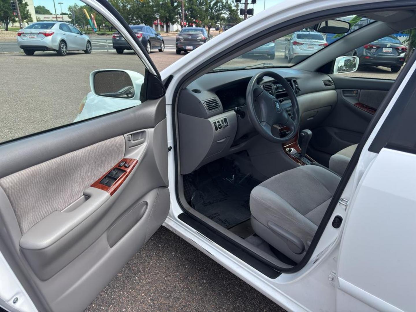 2007 WHITE Toyota Corolla CE (1NXBR32E97Z) with an 4 Cyl, 1.8L engine, Automatic transmission, located at 10890 W. Colfax Ave., Lakewood, CO, 80215, (303) 274-7692, 39.739914, -105.120132 - Photo#13