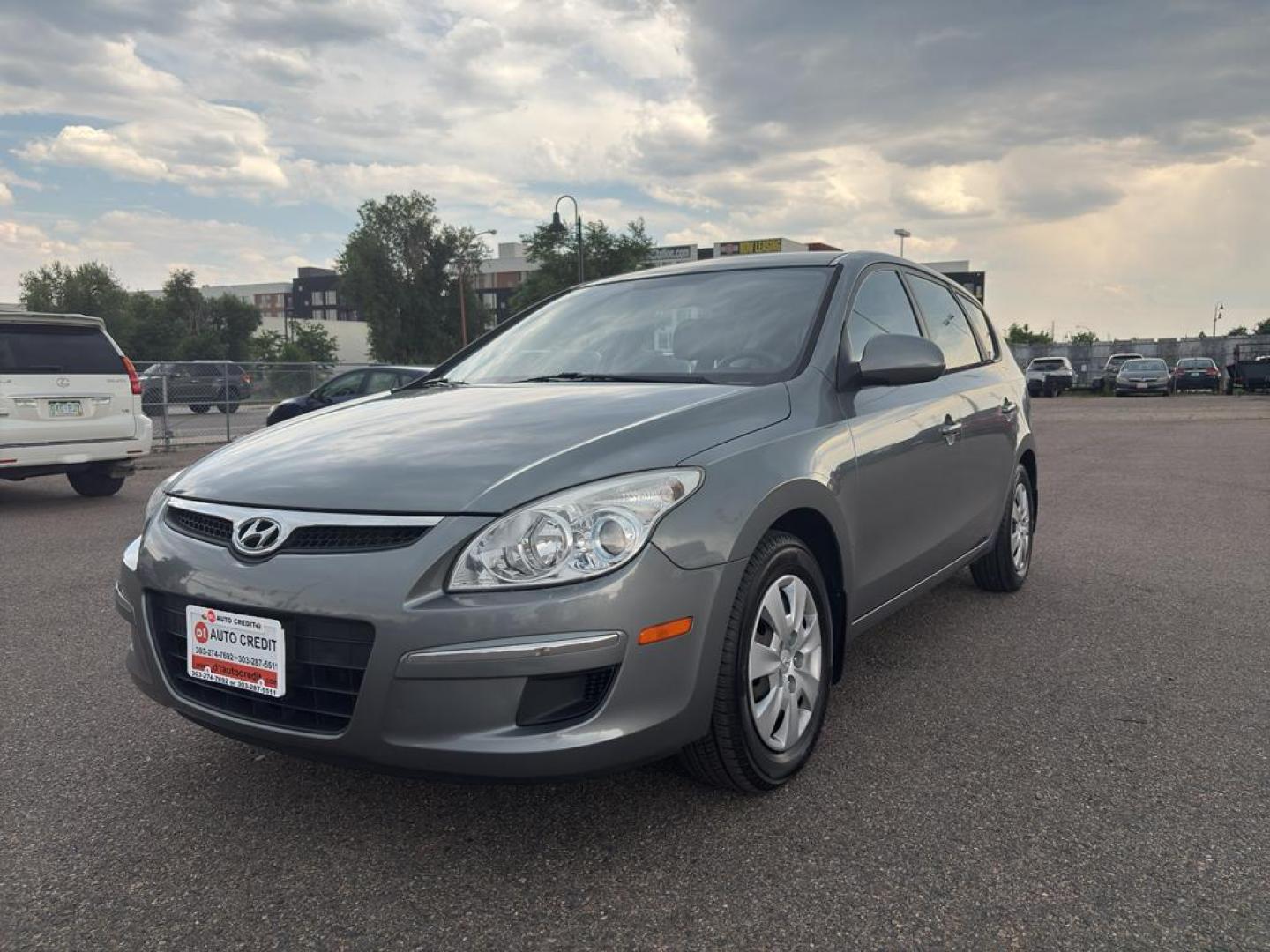 2011 GRAY Hyundai Elantra Touring SE MANUAL (KMHDB8AE1BU) with an 4 Cyl, 2.0L engine, Manual transmission, located at 10890 W. Colfax Ave., Lakewood, CO, 80215, (303) 274-7692, 39.739914, -105.120132 - Photo#0
