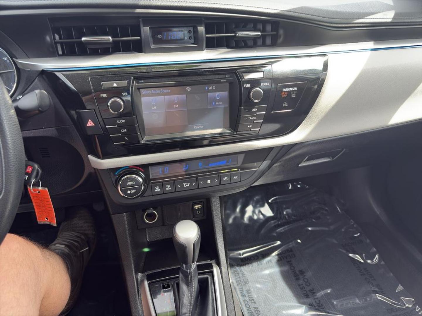 2015 SILVER Toyota Corolla L 4-SPEED AT (5YFBURHE1FP) with an 4 Cyl, 1.8L engine, Automatic transmission, located at 10890 W. Colfax Ave., Lakewood, CO, 80215, (303) 274-7692, 39.739914, -105.120132 - Photo#16