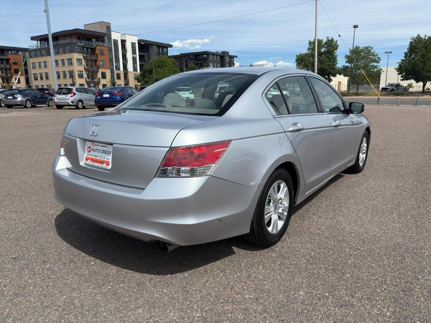 2009 SILVER Honda Accord LX-P (JHMCP26469C) with an 4 Cyl, 2.4L engine, Automatic transmission, located at 10890 W. Colfax Ave., Lakewood, CO, 80215, (303) 274-7692, 39.739914, -105.120132 - Photo#4