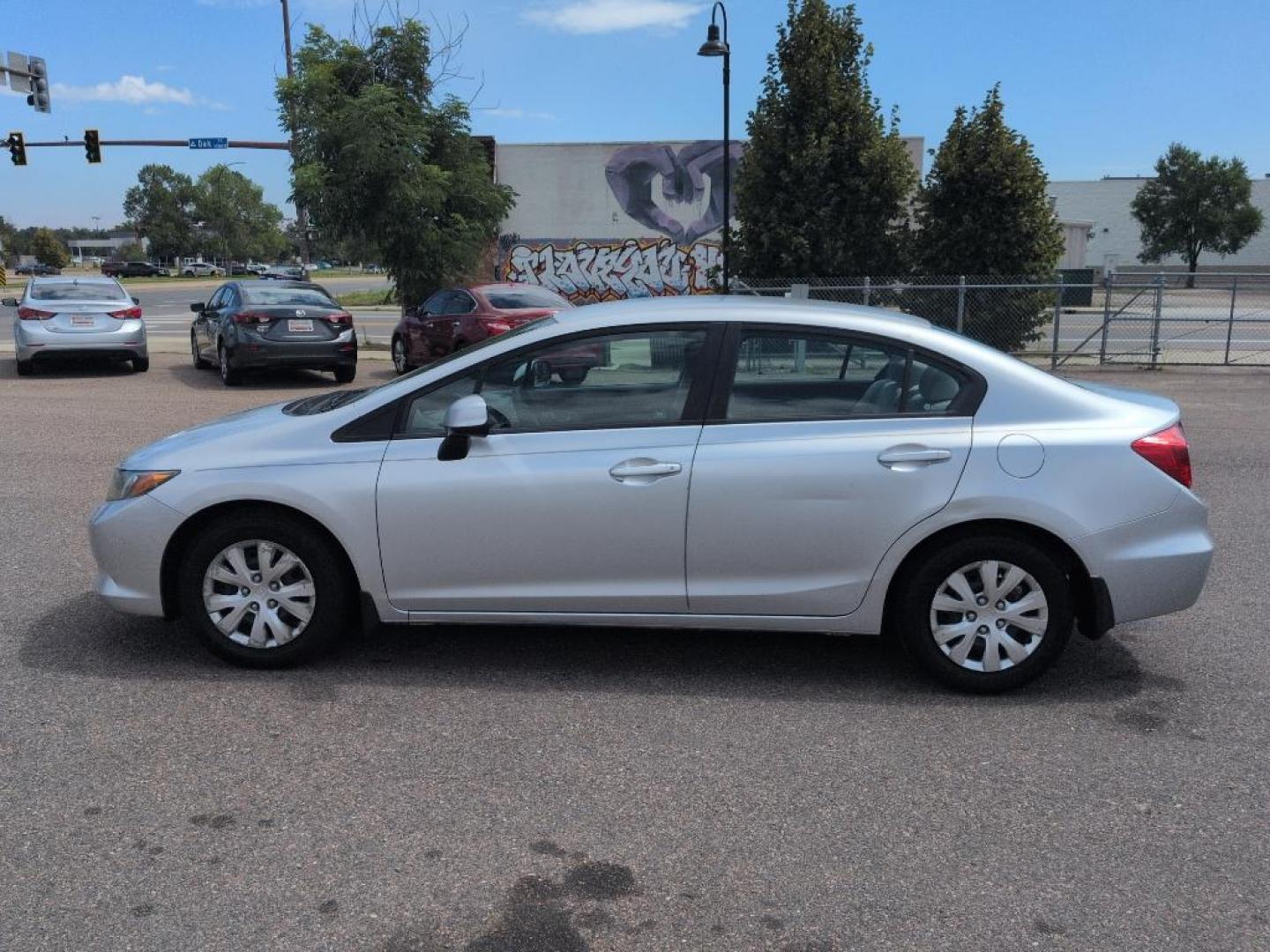 2012 GRAY Honda Civic LX (2HGFB2F50CH) with an 4 Cyl, 1.8L engine, Automatic transmission, located at 10890 W. Colfax Ave., Lakewood, CO, 80215, (303) 274-7692, 39.739914, -105.120132 - Photo#7