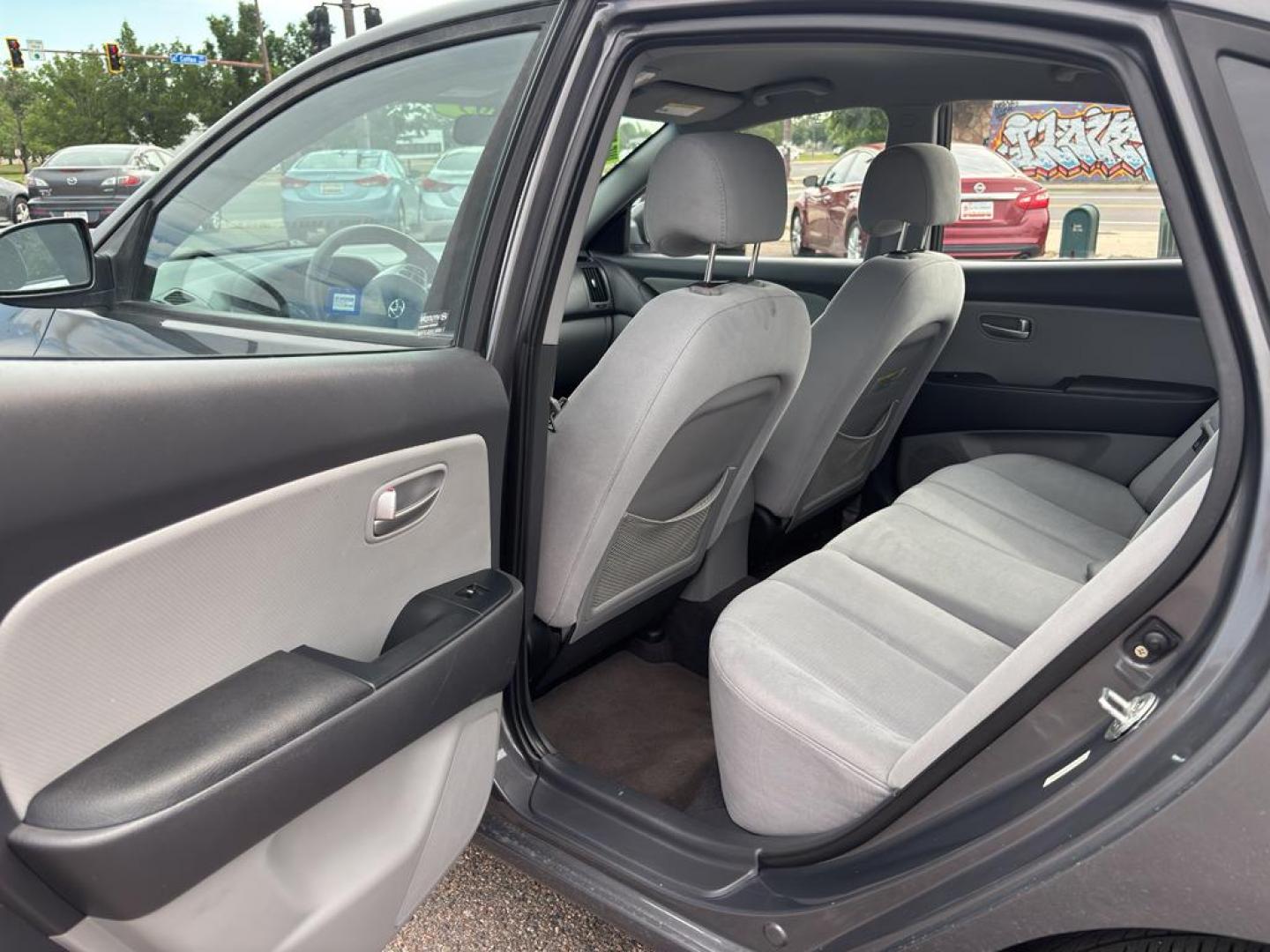2009 GRAY Hyundai Elantra GLS (KMHDU46D69U) with an 4 Cyl, 2.0L engine, Automatic transmission, located at 10890 W. Colfax Ave., Lakewood, CO, 80215, (303) 274-7692, 39.739914, -105.120132 - Photo#10