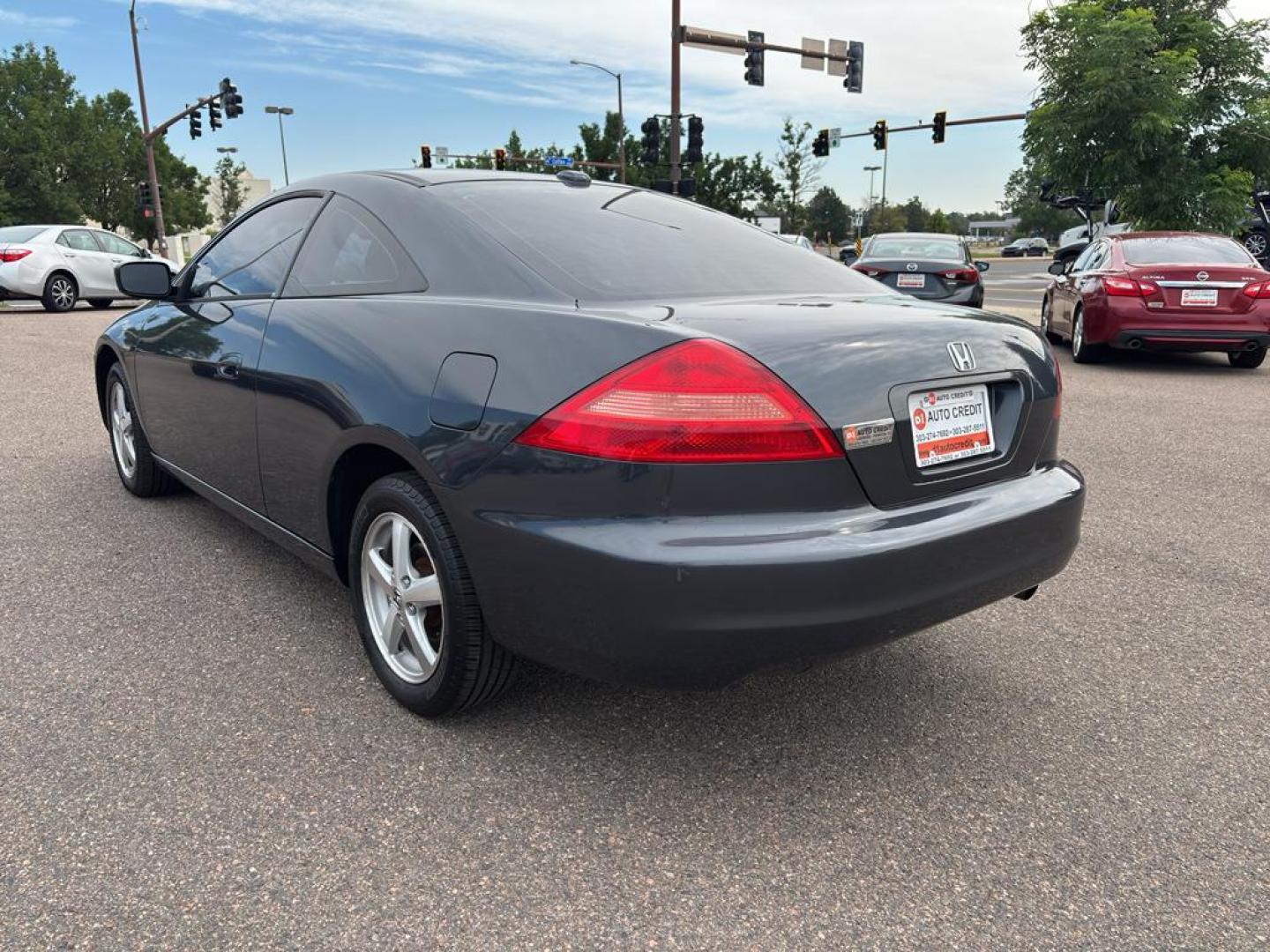 2004 BLACK Honda Accord EX (1HGCM72654A) with an 4 Cyl, 2.4L engine, Automatic transmission, located at 10890 W. Colfax Ave., Lakewood, CO, 80215, (303) 274-7692, 39.739914, -105.120132 - Photo#5