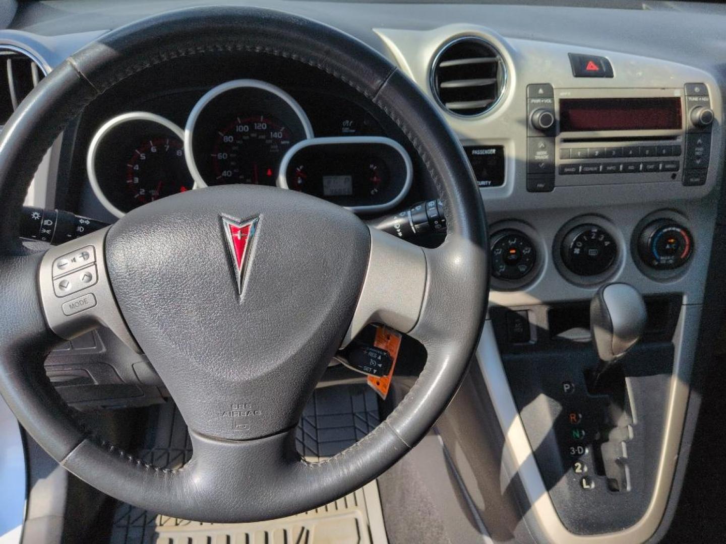 2009 SILVER Pontiac Vibe Base (5Y2SM67089Z) with an 4 Cyl, 2.4L engine, Automatic transmission, located at 10890 W. Colfax Ave., Lakewood, CO, 80215, (303) 274-7692, 39.739914, -105.120132 - Photo#11