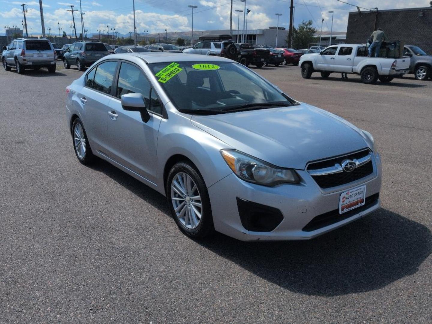 2012 SILVER Subaru Impreza Premium Plus S/R (JF1GJAD67CG) with an 4 Cyl, 2.0L engine, Manual transmission, located at 10890 W. Colfax Ave., Lakewood, CO, 80215, (303) 274-7692, 39.739914, -105.120132 - Photo#2