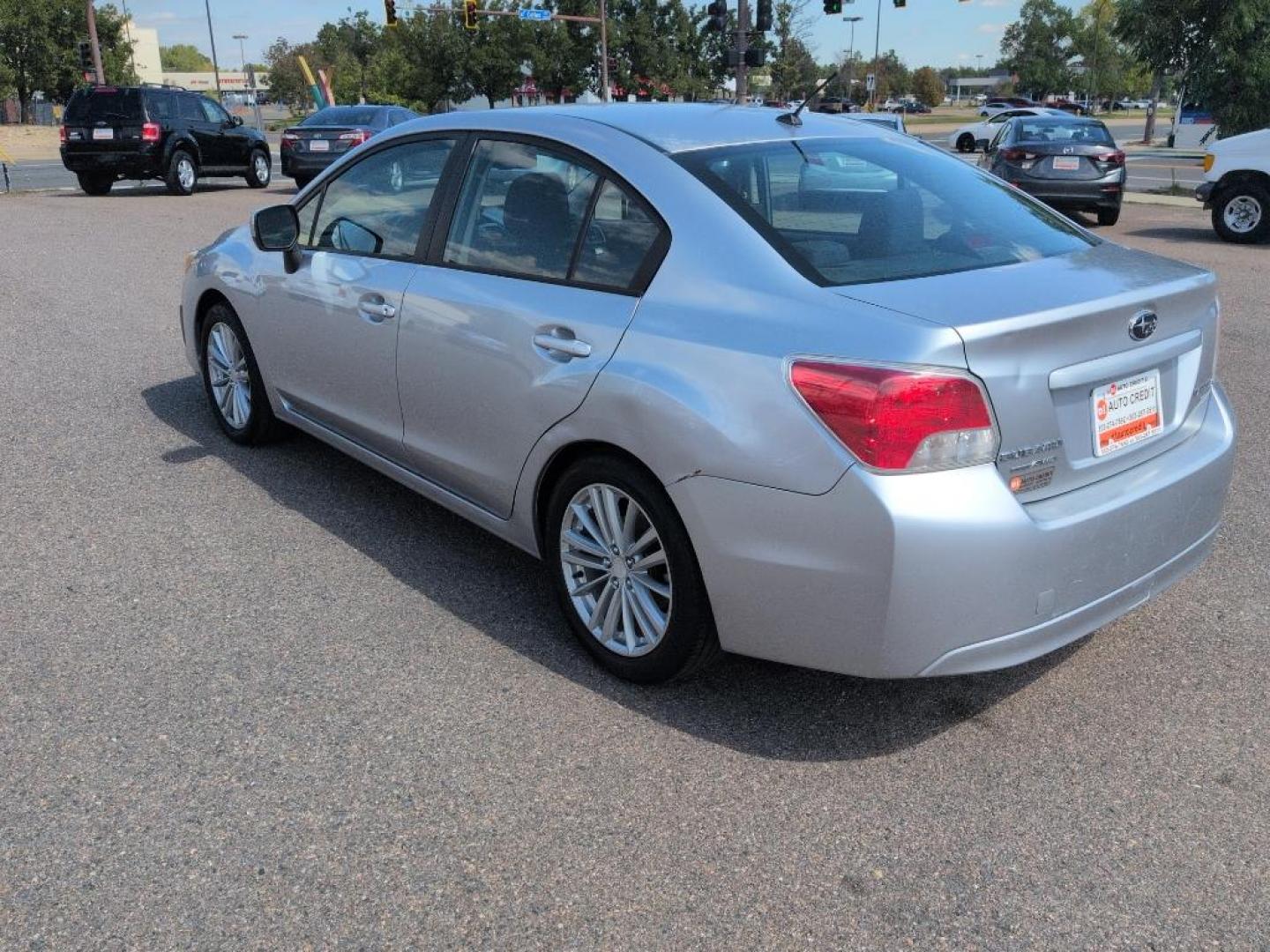 2012 SILVER Subaru Impreza Premium Plus S/R (JF1GJAD67CG) with an 4 Cyl, 2.0L engine, Manual transmission, located at 10890 W. Colfax Ave., Lakewood, CO, 80215, (303) 274-7692, 39.739914, -105.120132 - Photo#6