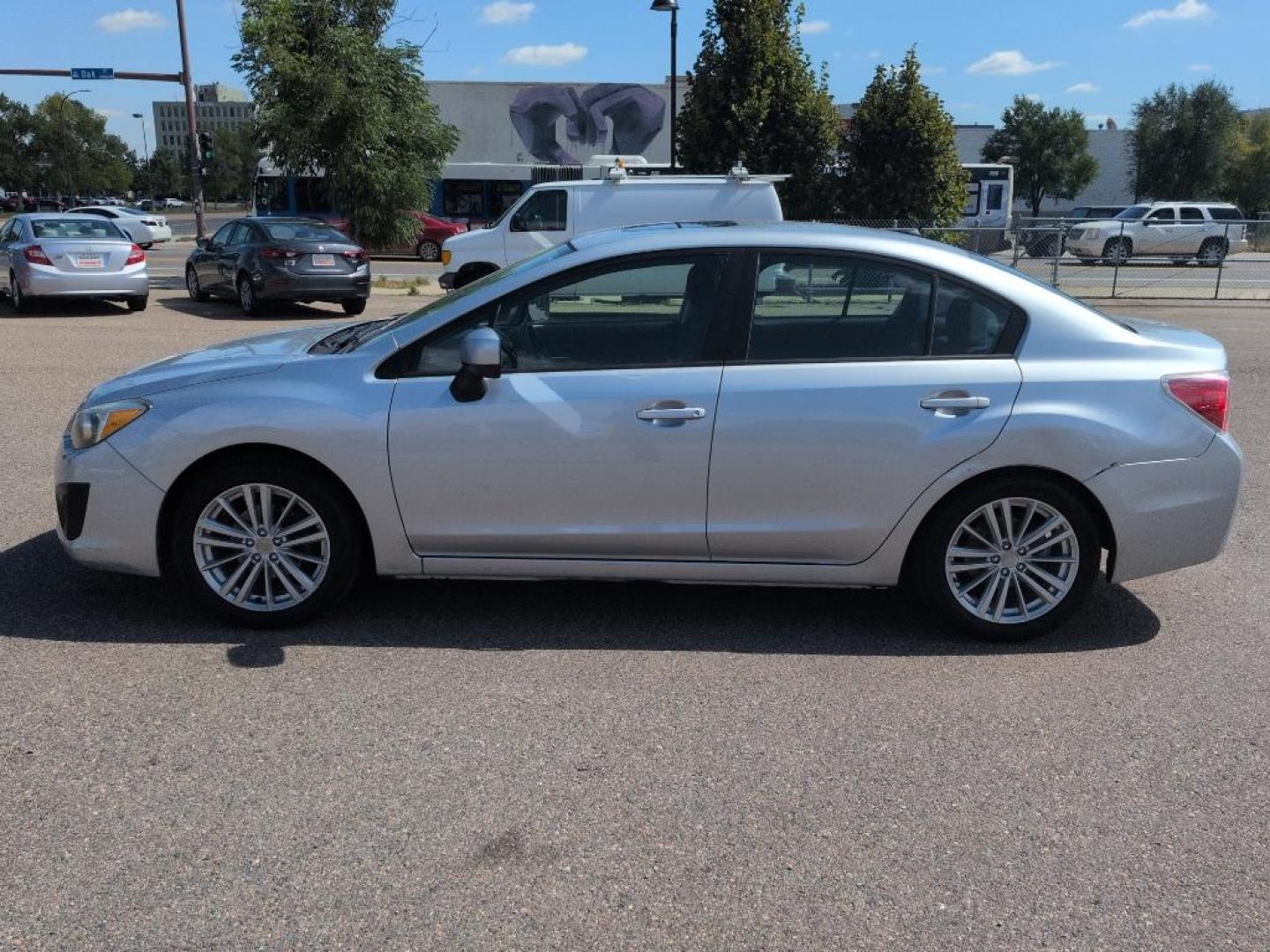 2012 SILVER Subaru Impreza Premium Plus S/R (JF1GJAD67CG) with an 4 Cyl, 2.0L engine, Manual transmission, located at 10890 W. Colfax Ave., Lakewood, CO, 80215, (303) 274-7692, 39.739914, -105.120132 - Photo#7