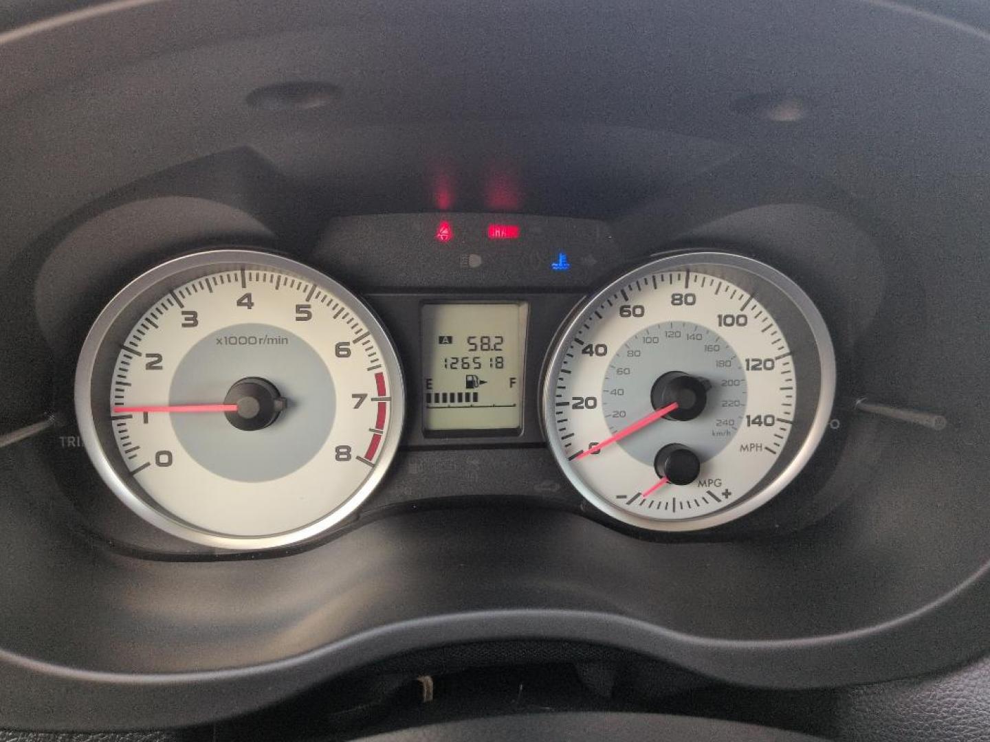 2012 SILVER Subaru Impreza Premium Plus S/R (JF1GJAD67CG) with an 4 Cyl, 2.0L engine, Manual transmission, located at 10890 W. Colfax Ave., Lakewood, CO, 80215, (303) 274-7692, 39.739914, -105.120132 - Photo#11