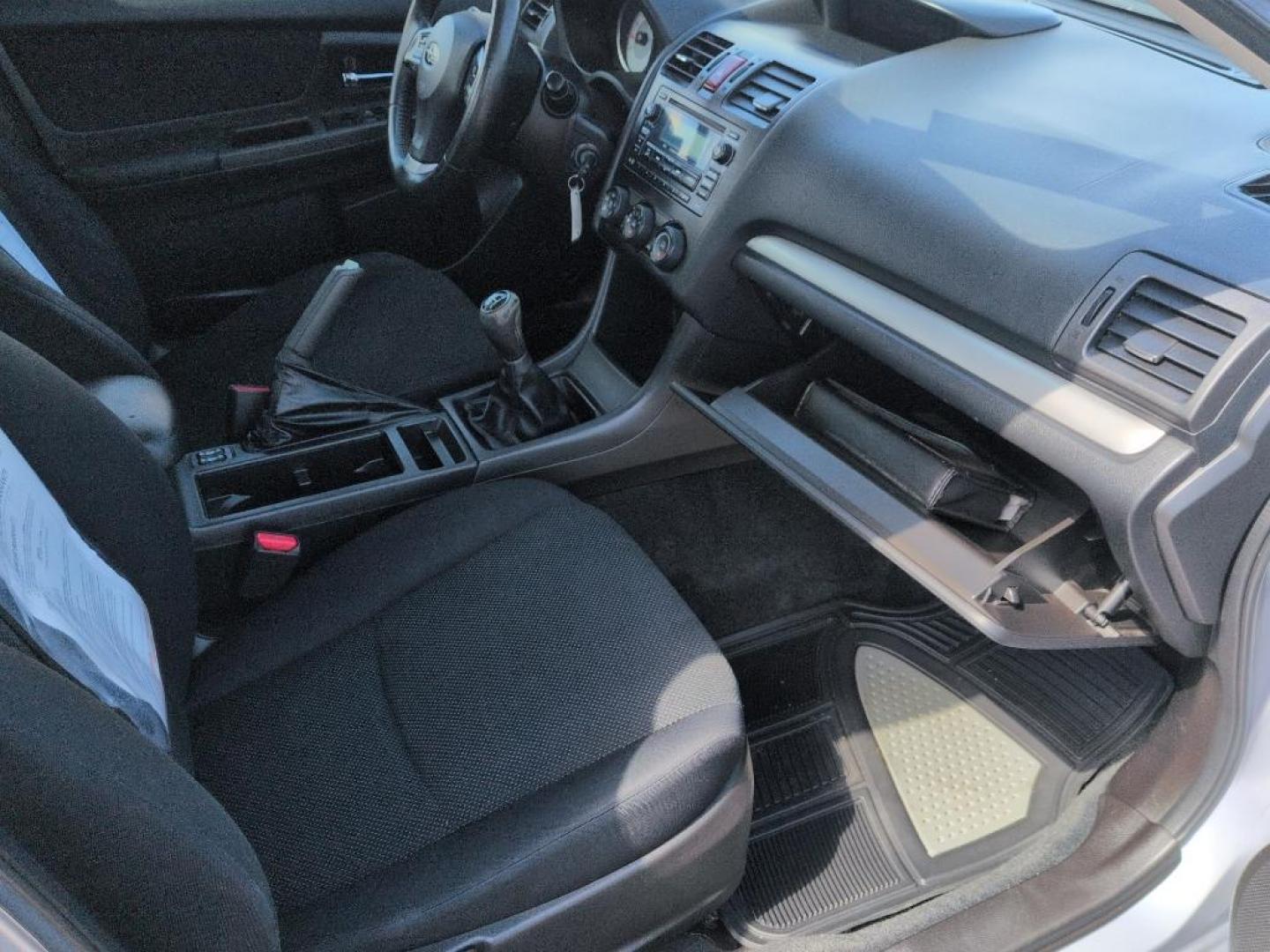 2012 SILVER Subaru Impreza Premium Plus S/R (JF1GJAD67CG) with an 4 Cyl, 2.0L engine, Manual transmission, located at 10890 W. Colfax Ave., Lakewood, CO, 80215, (303) 274-7692, 39.739914, -105.120132 - Photo#20