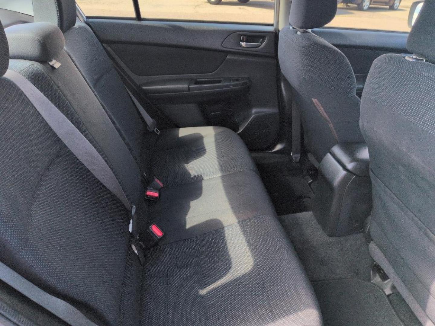 2012 SILVER Subaru Impreza Premium Plus S/R (JF1GJAD67CG) with an 4 Cyl, 2.0L engine, Manual transmission, located at 10890 W. Colfax Ave., Lakewood, CO, 80215, (303) 274-7692, 39.739914, -105.120132 - Photo#21