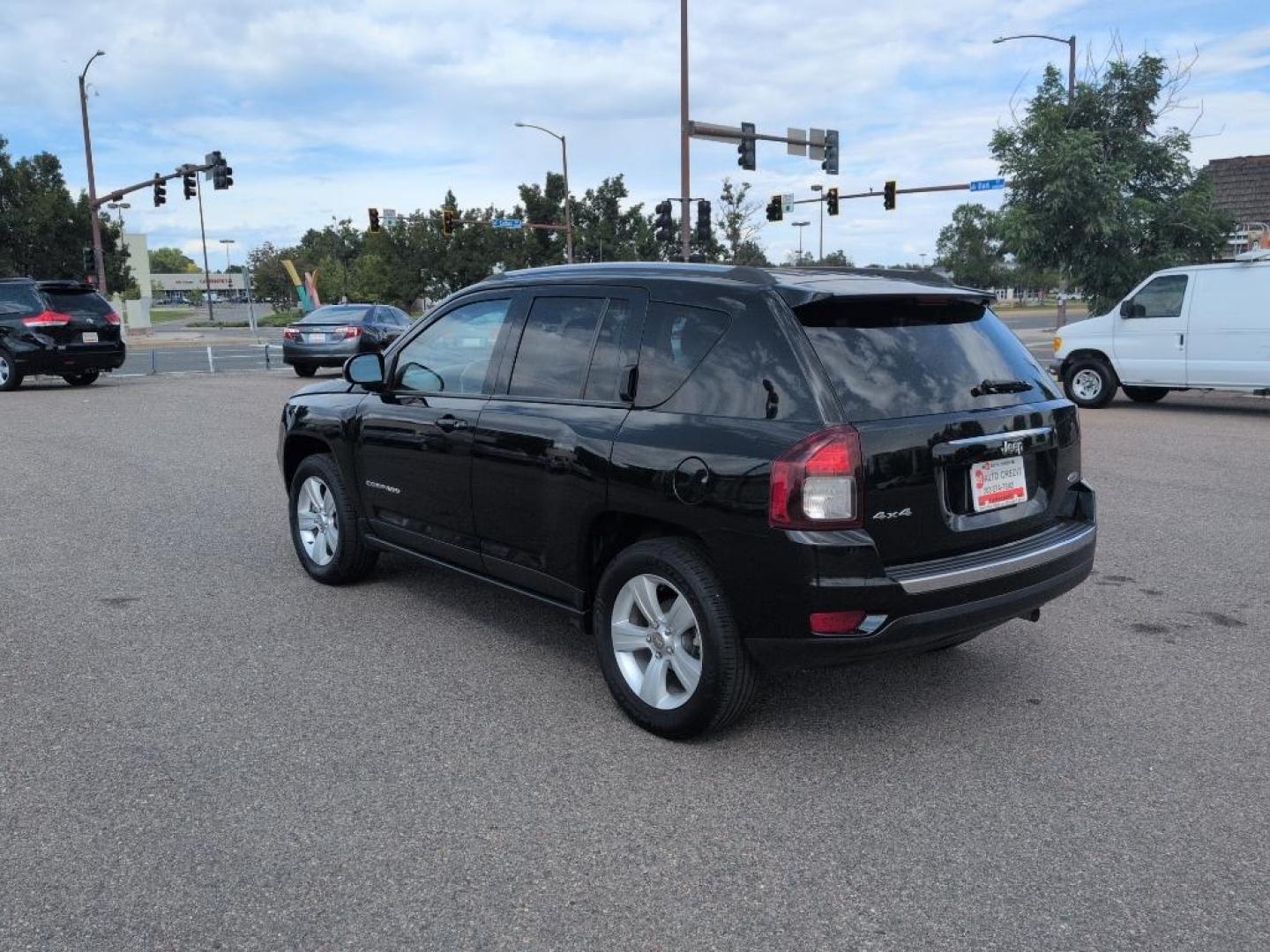 2015 BLACK Jeep Compass Latitude (1C4NJDEB8FD) with an 4 Cyl, 2.4L engine, Automatic transmission, located at 10890 W. Colfax Ave., Lakewood, CO, 80215, (303) 274-7692, 39.739914, -105.120132 - Photo#6
