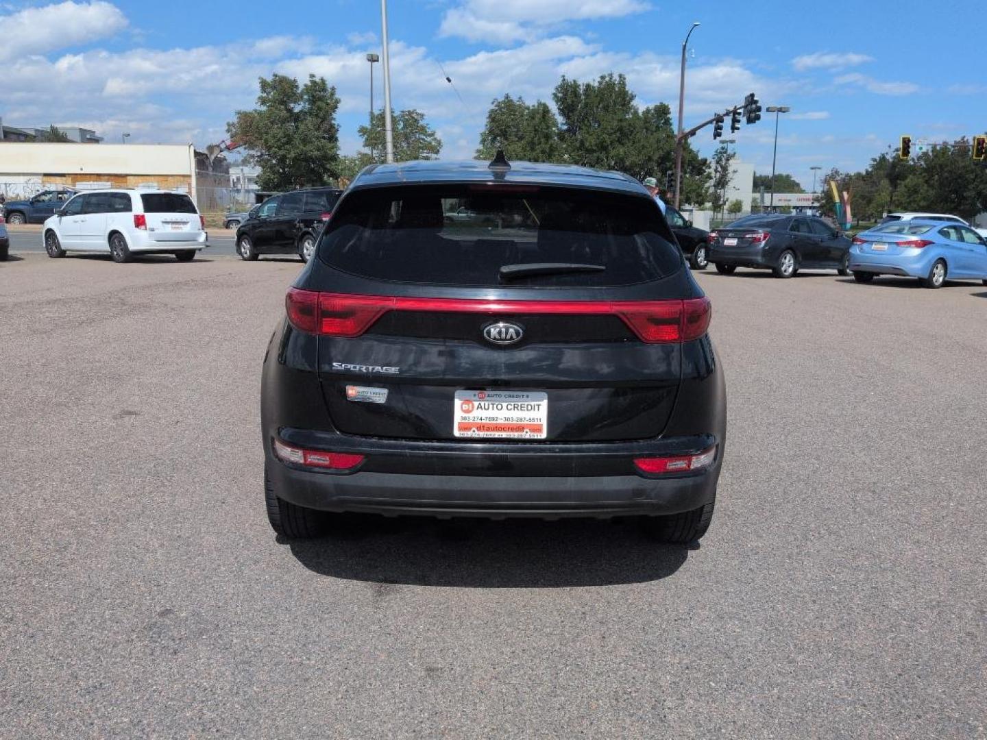 2017 BLACK Kia Sportage LX (KNDPMCAC9H7) with an 4 Cyl, 2.4L engine, Automatic transmission, located at 10890 W. Colfax Ave., Lakewood, CO, 80215, (303) 274-7692, 39.739914, -105.120132 - Photo#5
