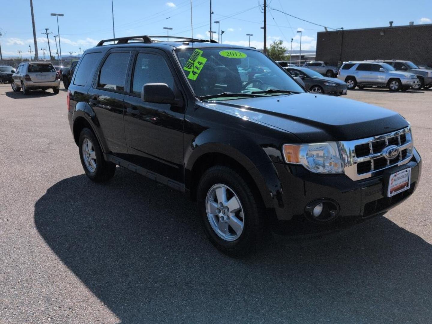 2012 BLACK Ford Escape XLT (1FMCU0D76CK) with an 4 Cyl, 2.5L engine, Automatic transmission, located at 10890 W. Colfax Ave., Lakewood, CO, 80215, (303) 274-7692, 39.739914, -105.120132 - Photo#2