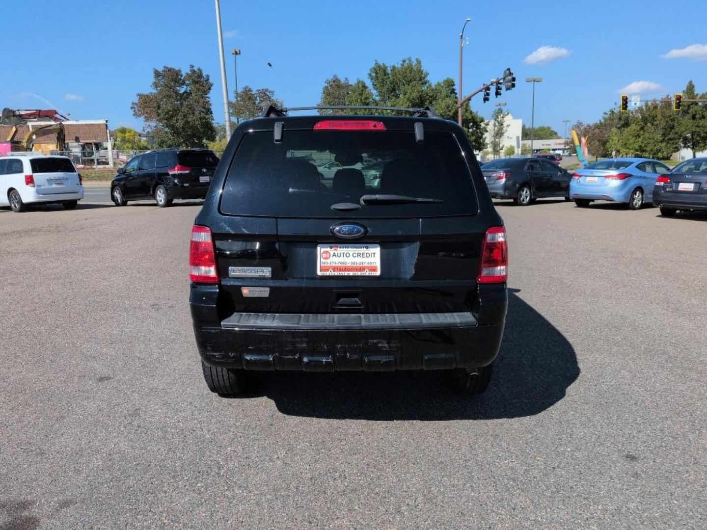 2012 BLACK Ford Escape XLT (1FMCU0D76CK) with an 4 Cyl, 2.5L engine, Automatic transmission, located at 10890 W. Colfax Ave., Lakewood, CO, 80215, (303) 274-7692, 39.739914, -105.120132 - Photo#5