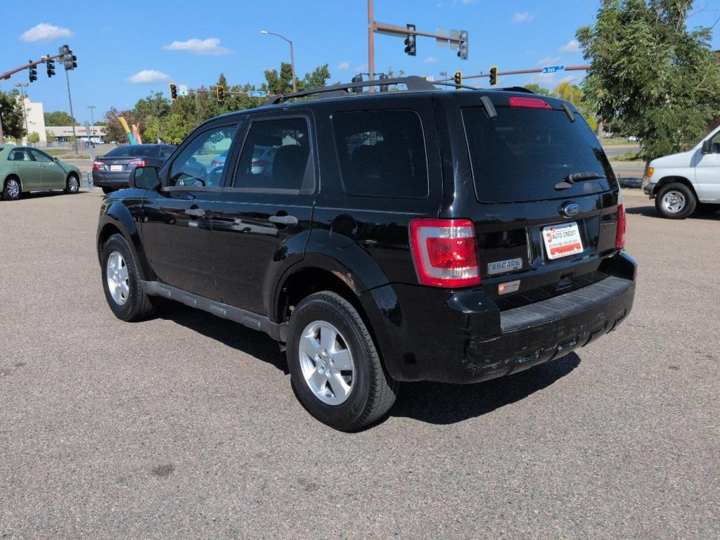 2012 BLACK Ford Escape XLT (1FMCU0D76CK) with an 4 Cyl, 2.5L engine, Automatic transmission, located at 10890 W. Colfax Ave., Lakewood, CO, 80215, (303) 274-7692, 39.739914, -105.120132 - Photo#6