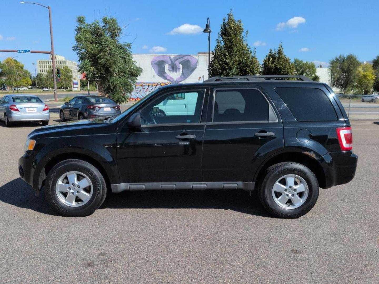 2012 BLACK Ford Escape XLT (1FMCU0D76CK) with an 4 Cyl, 2.5L engine, Automatic transmission, located at 10890 W. Colfax Ave., Lakewood, CO, 80215, (303) 274-7692, 39.739914, -105.120132 - Photo#7