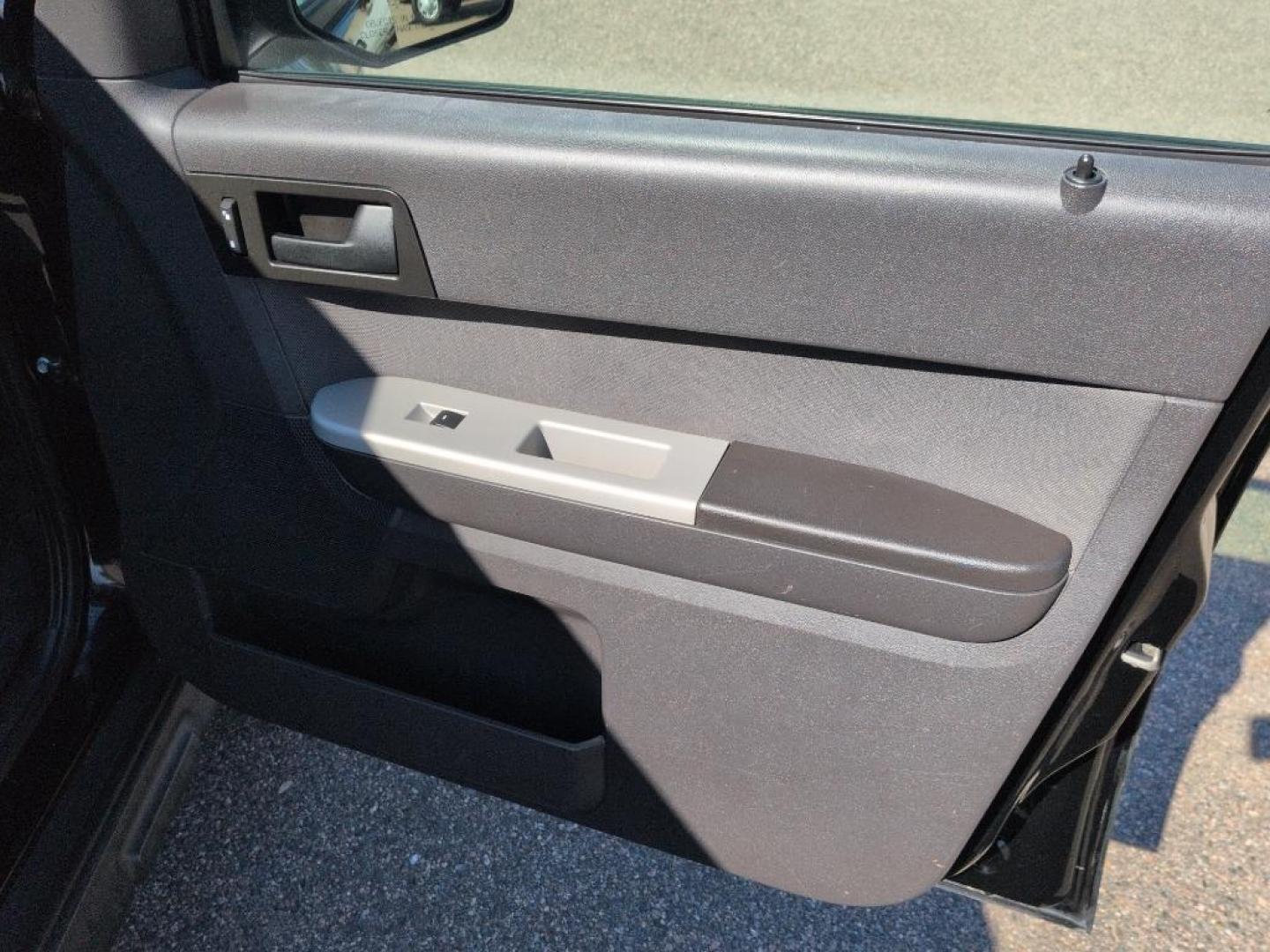 2012 BLACK Ford Escape XLT (1FMCU0D76CK) with an 4 Cyl, 2.5L engine, Automatic transmission, located at 10890 W. Colfax Ave., Lakewood, CO, 80215, (303) 274-7692, 39.739914, -105.120132 - Photo#18