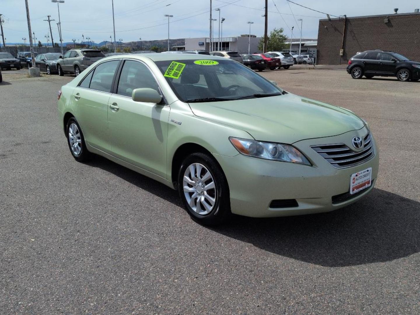 2009 GREEN Toyota Camry Hybrid (4T1BB46K99U) with an 4 Cyl, 2.4L engine, Automatic transmission, located at 10890 W. Colfax Ave., Lakewood, CO, 80215, (303) 274-7692, 39.739914, -105.120132 - Photo#2