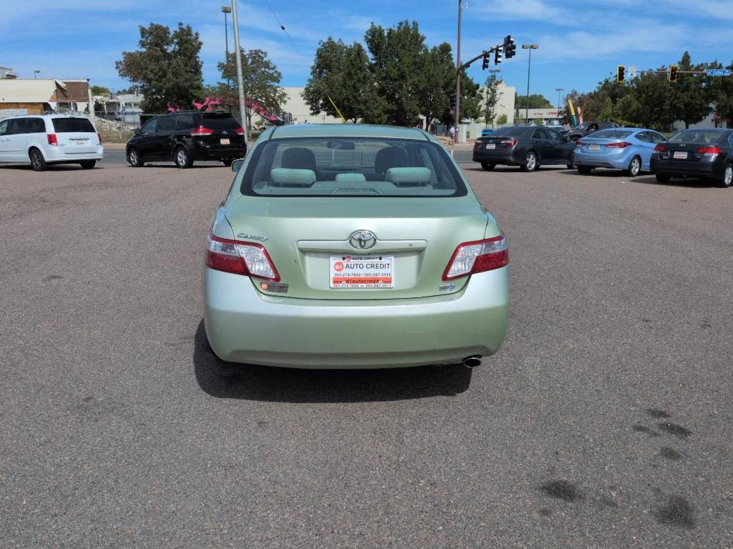 2009 GREEN Toyota Camry Hybrid (4T1BB46K99U) with an 4 Cyl, 2.4L engine, Automatic transmission, located at 10890 W. Colfax Ave., Lakewood, CO, 80215, (303) 274-7692, 39.739914, -105.120132 - Photo#5