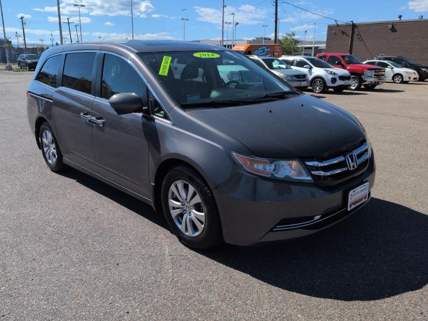 2014 GRAY Honda Odyssey EX-L (5FNRL5H65EB) with an V6, 3.5L engine, Automatic transmission, located at 10890 W. Colfax Ave., Lakewood, CO, 80215, (303) 274-7692, 39.739914, -105.120132 - Photo#2