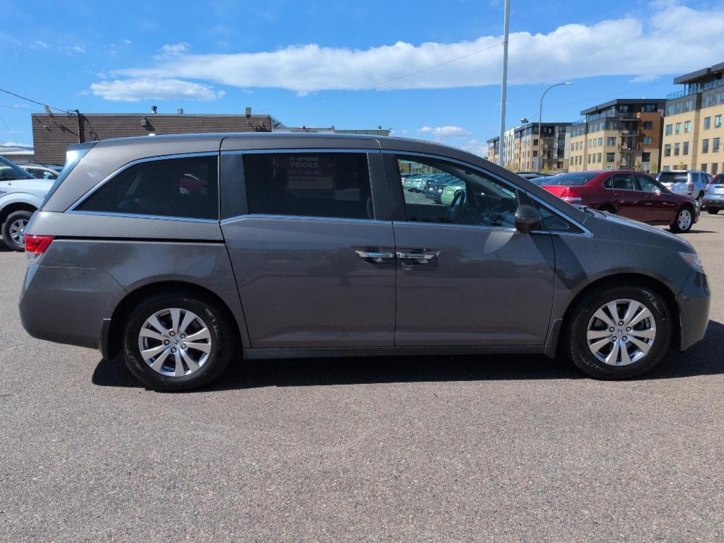 2014 GRAY Honda Odyssey EX-L (5FNRL5H65EB) with an V6, 3.5L engine, Automatic transmission, located at 10890 W. Colfax Ave., Lakewood, CO, 80215, (303) 274-7692, 39.739914, -105.120132 - Photo#3